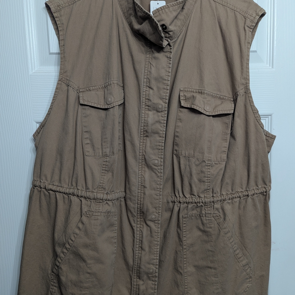 Woman Within Tan Sleeveless Vest